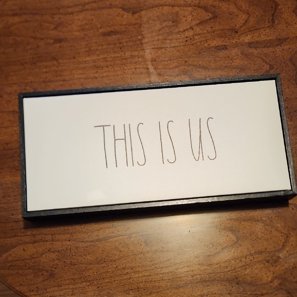 Black and White 'This Is Us' Sign